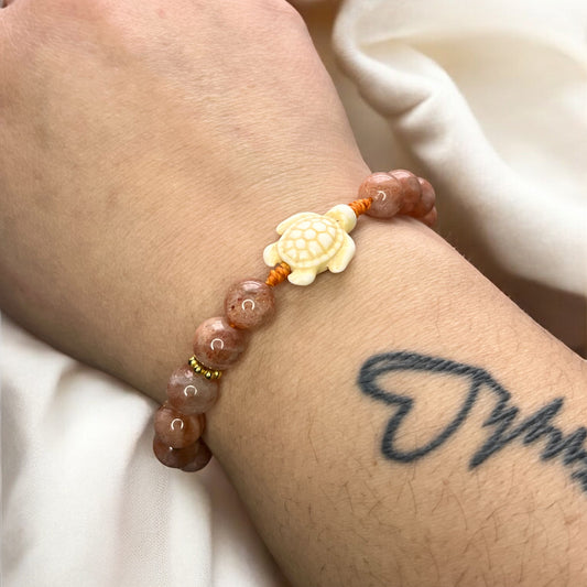 Bracelet ajustable Femme pierre de soleil et tortue (13)